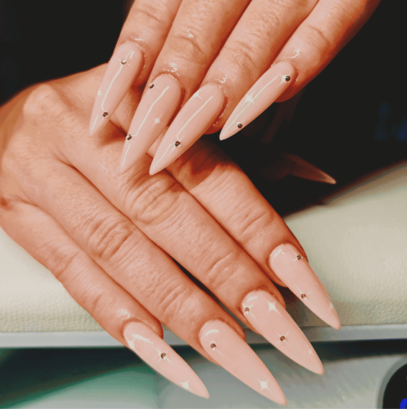 gel x nail extensions with glitters
