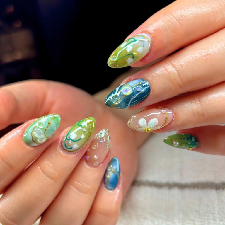 green nail extensions with flowers